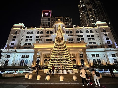 People enjoy the Christmas festivities and decoration at the Winter Garden at Al Habtoor City in Dubai on 8th December, 2022. Photo Clint Egbert/Gulf News