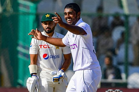 England's Rehan Ahmed (right) celebrates after the dismissing Pakistan's Saud Shakeel during the third Test. The leg-spinner finished with a five-wicket haul in his debut Test.