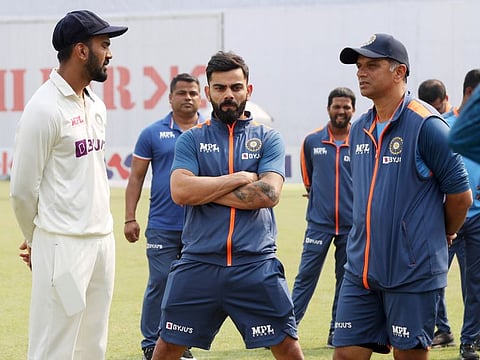 India's Head Coach Rahul Dravid interacting with Virat Kohli and captain KL Rahul after the team's win in the second Test in Dhaka on Sunday.