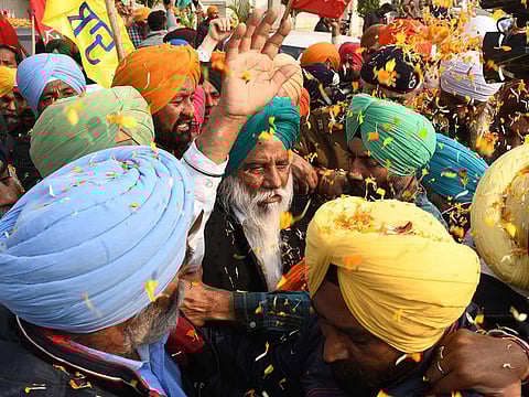 Indian farmers' leader Balbir Singh Rajewal (centre) during his visit to the Golden Temple in Amritsar earlier this month. Rajewal was named as the leader of the newly-formed Indian farmers' party Samyukt Samaj Morcha.