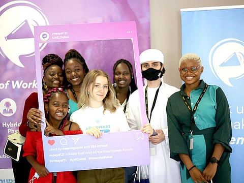 A group of student participants at the AIESEC Youth Speak Forum