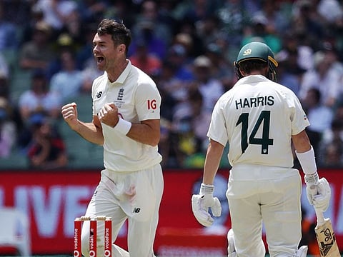 England pacer James Anderson celebrates after dismissing Australia's Marcus Harris during day 2 of the third Test at the Melbourne Cricket Ground on Monday.