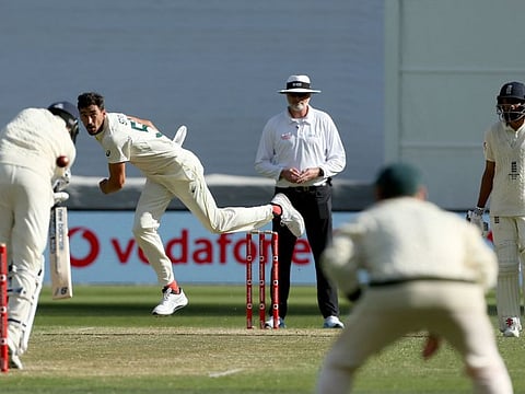 Australia's pacer Mitchell Starc narrowly beats England captain Joe Root's bat on his hat-trick ball during the second day of the third Ashes Test in Melbourne on Monday.