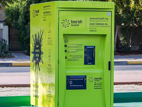 A used cooking oil collection machine for recycling near the parking lot of Sharjah National Park