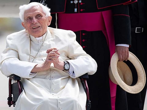 In this file photo taken on June 22, 2020 former Pope Benedict XVI poses for a picture at the airport in Munich, southern Germany, before his departure.