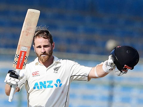 New Zealand's Kane Williamson celebrates scoring a double century during the fourth day of the first Test against Pakistan at the National stadium in Karachi on December 29, 2022.