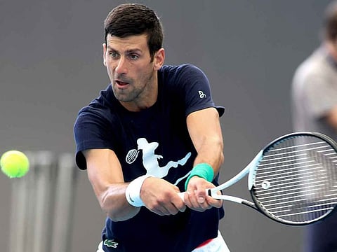 Serbia's Novak Djokovic makes a backhand return during a practice session ahead of the Adelaide International Tennis tournament in Adelaide, Australia, Thursday, December 29, 2022.
