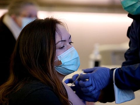 People receive free COVID-19 vaccinations and booster shots at Los Angeles International Airport in Los Angeles, California.