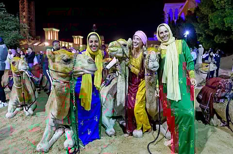 Marie-Emmanuelle Checri from France, Malika Kostenko from Russia and Taylor Dees from USA at Global Village as 35 camel riders from 16 nationalities, Including UAE, finished the 600km camel trek 9th UAE Camel Trek organised by Hamdan Bin Mohammed Heritage Center. Photo: Virendra Saklani/Gulf News