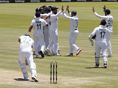 Indian players celebrate after dismissing South Africa's Lungi Ngidi that game the visitors the victory in the first Test.