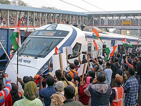 People gather to get a glimpse of Vande Bharat Express train that connects Howrah to New Jalpaiguri, virtually flagged off by Prime Minister Narendra Modi from Gandhinagar, at Bolpur Shantiniketan Station, in Birbhum on Friday, December 30, 2022.