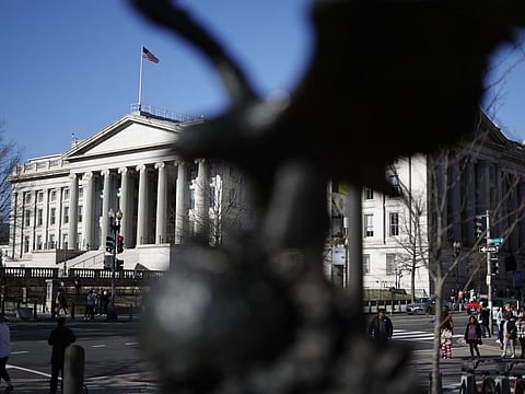 The Federal Reserve's preferred inflation measures eased in November while consumer spending stagnated, suggesting the central bank's interest-rate hikes are helping to cool both price pressures and broader demand, with more tightening on the way.