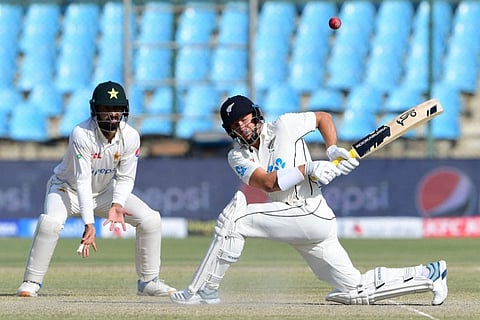 New Zealand's Neil Wagner (right) plays a shot during the fourth day of the first Test match against Pakistan at the National Stadium in Karachi. The second Test starts tomorrow.