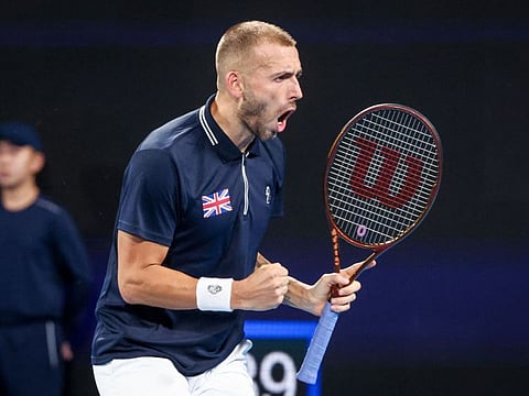 Britains Daniel Evans celebrates winning against Spains Albert Ramos-Vinolas during their mens singles match at the United Cup tennis tournament in Sydney.