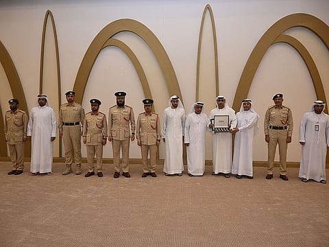 Brigadier Abdullah Hasan being honoured for putting in 30 years of dedicated service at Dubai Police.