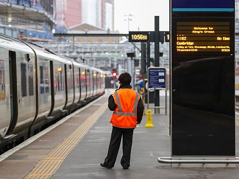 An employee on a platform during strike action at London King's Cross railway station in London, UK, on Tuesday, Jan. 3, 2023.