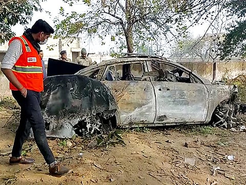 Transport Ministry team inspects the car of cricketer Rishabh Pant after it met with an accident, at Delhi-Dehradun highway near the Roorkee border, in Haridwar on Saturday.