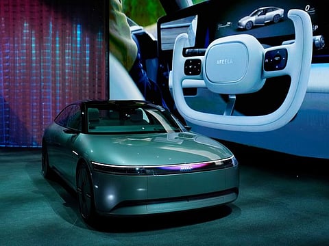 The electric vehicle prototype car Afeela, a joint venture between Sony and Honda, is on display during a Sony news conference before the start of the CES tech show Wednesday, Jan. 4, 2023, in Las Vegas. (AP Photo/John Locher)