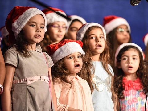 Children sing Christmas songs at the Coptic St. Mina Jebel Ali Church in Dubai in this file photo.