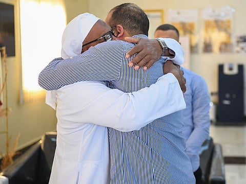 A prisoner in Ras Al Khaimah jail meeting with his family member who was flown in from an Arab country by the police.
