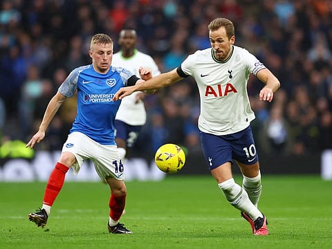 Portsmouth's Joe Morrell (left) in action with Tottenham Hotspur's Harry Kane.
