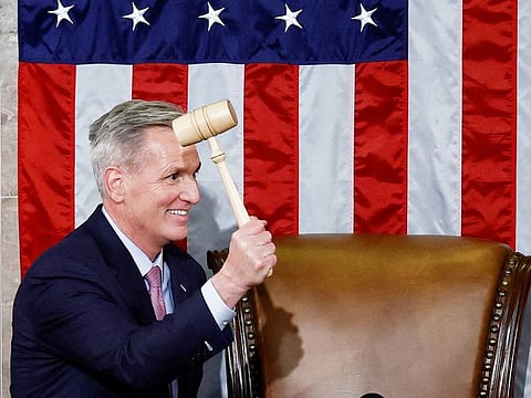 Kevin McCarthy wields the Speaker's gavel after being elected  the next Speaker of the US House of Representatives in a late night 15th round of voting on the fourth day of the 118th Congress at the US Capitol in Washington, on  January 7, 2023.