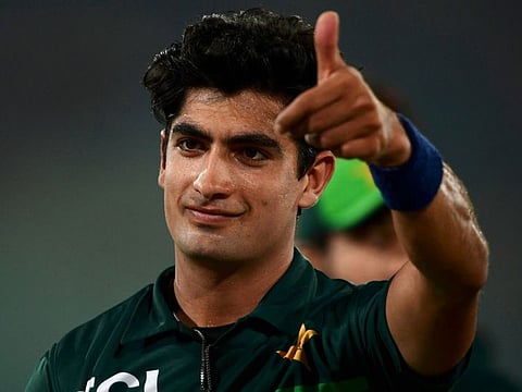 Pakistan's Naseem Shah celebrates after he took five wickets during the first one-day international (ODI) cricket match against New Zealand at the National Stadium in Karachi.