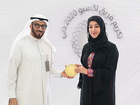 Minister Reem Al Hashimi (R) honouring Lt Gen Mohammed Ahmed Al Marri