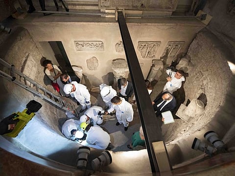 This file handout photo made available by the Vatican Media on July 20, 2019 shows the opening of the ossuary at the Teutonic Cemetery in the Vatican as part of a probe into the case of Emanuela Orlandi, a teenager who disappeared in 1983 in one of Italy's darkest mysteries.