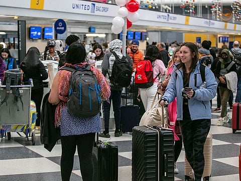 Passengers wait for the resumption of flights at O'Hare International Airport.