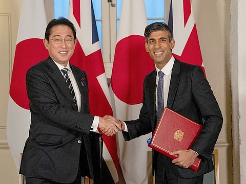 Britain's Prime Minister, Rishi Sunak and Japan's Prime Minister, Fumio Kishida, shake hands after signing a defence agreement at the Tower of London on January 11, 2023 in London.