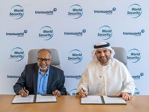 Ayoub Al Mulla, Chief Operating Officer of World Security, and Ramesh S Ramakrishnan, Chairman of Transworld Group sign an agreement to strengthen workforce in the UAE and India.