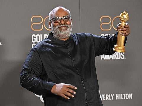 Indian film composer M. M. Keeravani poses with the award for Best Song - Motion Picture for "Naatu Naatu" from "RRR" in the press room during the 80th annual Golden Globe Awards at The Beverly Hilton hotel in Beverly Hills, California, on January 10, 2023.