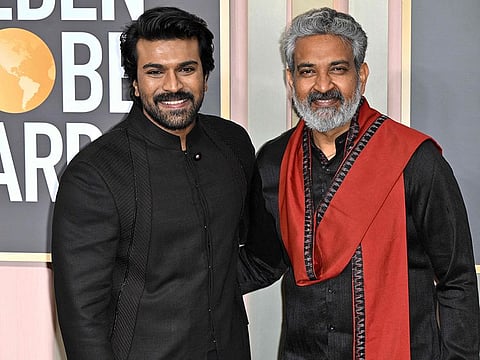 Indian actor Ram Charan and Indian film director S. S. Rajamouli arrive for the 80th annual Golden Globe Awards at The Beverly Hilton hotel in Beverly Hills, California, on January 10, 2023.