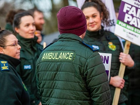 Ambulance workers on a picket line during strike action near Central Ambulance Station in Manchester, UK, on Wednesday, Jan. 11, 2023.