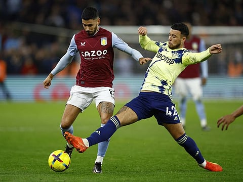 Aston Villa's Morgan Sanson (left) in action with Leeds United's Sam Greenwood during the Premier League clash at Villa Park, Birmingham.