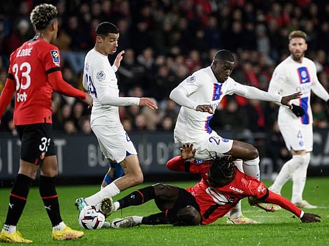 Rennes' French midfielder Chimuanya Ugochukwa fights for the ball with Paris Saint-Germain's French defender Nordi Mukiele during the French Ligue 1 match at the Roazhon Park stadium in Rennes, western France.