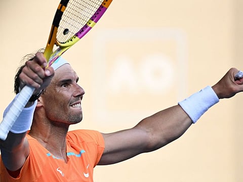 Spain's Rafael Nadal celebrates after winning against Britain's Jack Draper during their men's singles match on day one of the Australian Open in Melbourne.