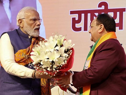 Indian Prime Minister Narendra Modi congratulates BJP National President JP Nadda, whose term was extended till June 2024, during the second day of Bharatiya Janata Party National Executive Meeting in New Delhi on January 17, 2023. The party, preparing for national elections, is targeting voters between the ages of 18 and 25.