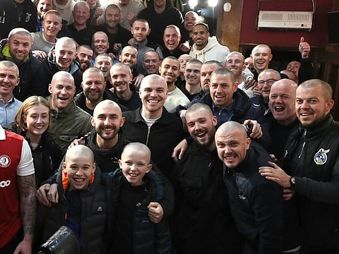 Bristol Rovers exemplified their togetherness in a heartfelt and brilliant way by shaving their heads in support for their cancer-stricken team mate Nick Anderton.