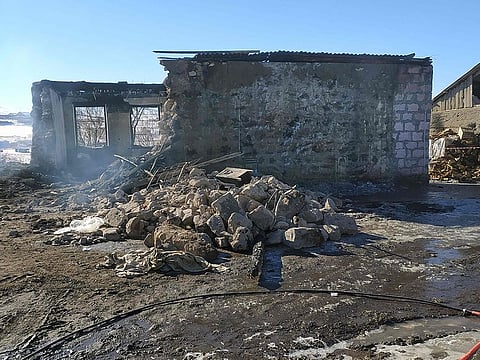 Photo shows a burnt-out Armenian army barracks taken after a fire in the village of Azat, some 170kms east of Yerevan on January 19, 2023.