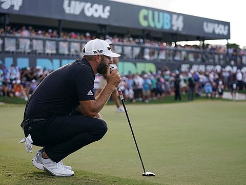 Dustin Johnson looks over the 18th green during the final round of the season finale of the LIV Golf series at Trump National Doral.