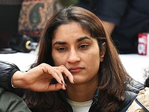 Indian wrestler Vinesh Phogat along with others wrestlers takes part in an ongoing protest against the Wrestling Federation of India (WFI), in New Delhi on January 19, 2023, following allegations of sexual harassment to athletes by members of the WFI.