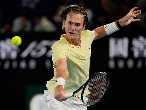 Sebastian Korda of the US plays a backhand return during his win over Daniil Medvedev in Australian Open on Friday.