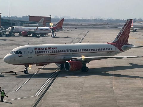 An Air India aircraft is pictured on the tarmac at the Indira Gandhi International airport in New Delhi on January 20, 2023. Currently, the matter lies with the Court and the case has witnessed many twists in the last couple of days. Shankar Mishra was arrested from Bengaluru and brought to Delhi where the case against him was registered.