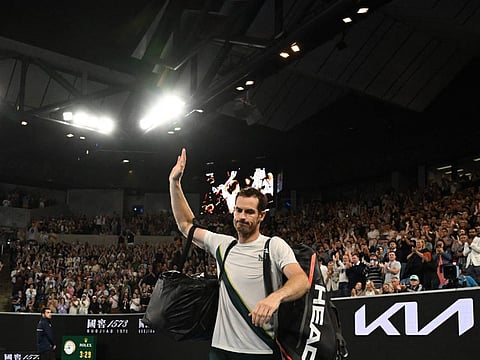 Britain's Andy Murray waves as he leaves after losing to Spain's Roberto Bautista Agut during their men's singles match on day six of the Australian Open tennis tournament in Melbourne.
