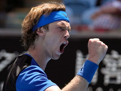 Andrey Rublev of Russia reacts after beating Dan Evans of Britain during their third round match at the Australian Open tennis championship in Melbourne, Australia.