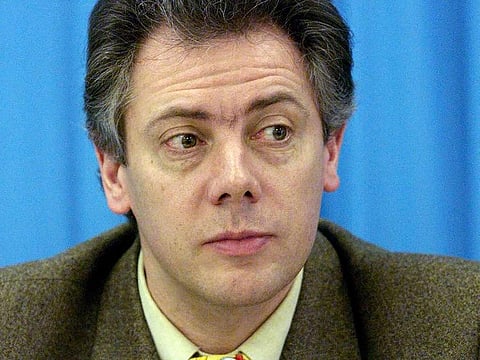 In this file photo taken on January 30, 1999, then French figure-skating team coach Gilles Beyer speaks at a press conference at The European Figure Skating Championships in Prague.