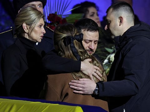 Ukraine's President Volodymyr Zelensky and first lady Olena Zelenska attend a memorial ceremony for Ukrainian Interior Minister Denys Monastyrsky, his deputy and officials who died in the helicopter crash near Kyiv, in Kyiv, Ukraine, January 21, 2023.