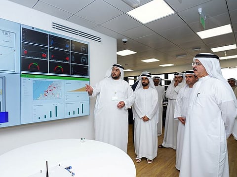 DEWA CEO Al Tayer (right) during a visit to the R&D Centre at MBR Solar Park in Dubai